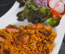 Load image into Gallery viewer, Smoked  Salmon Jollof Rice
